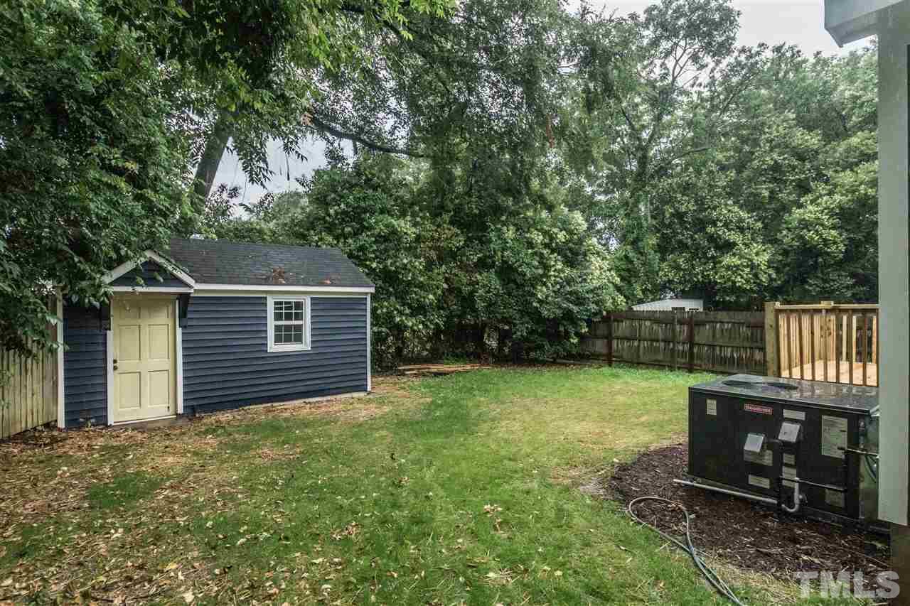 915 Elm Street Raleigh, NC 27604 - Photo 23 of 25 a backyard of a house with trampoline