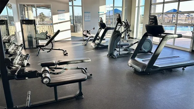 a view of a lake with houses in the background