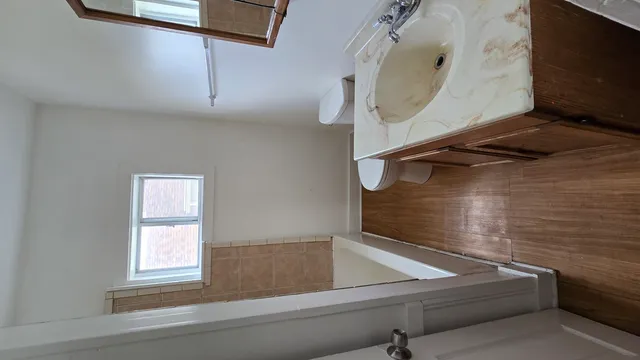 a view of an entryway with a window