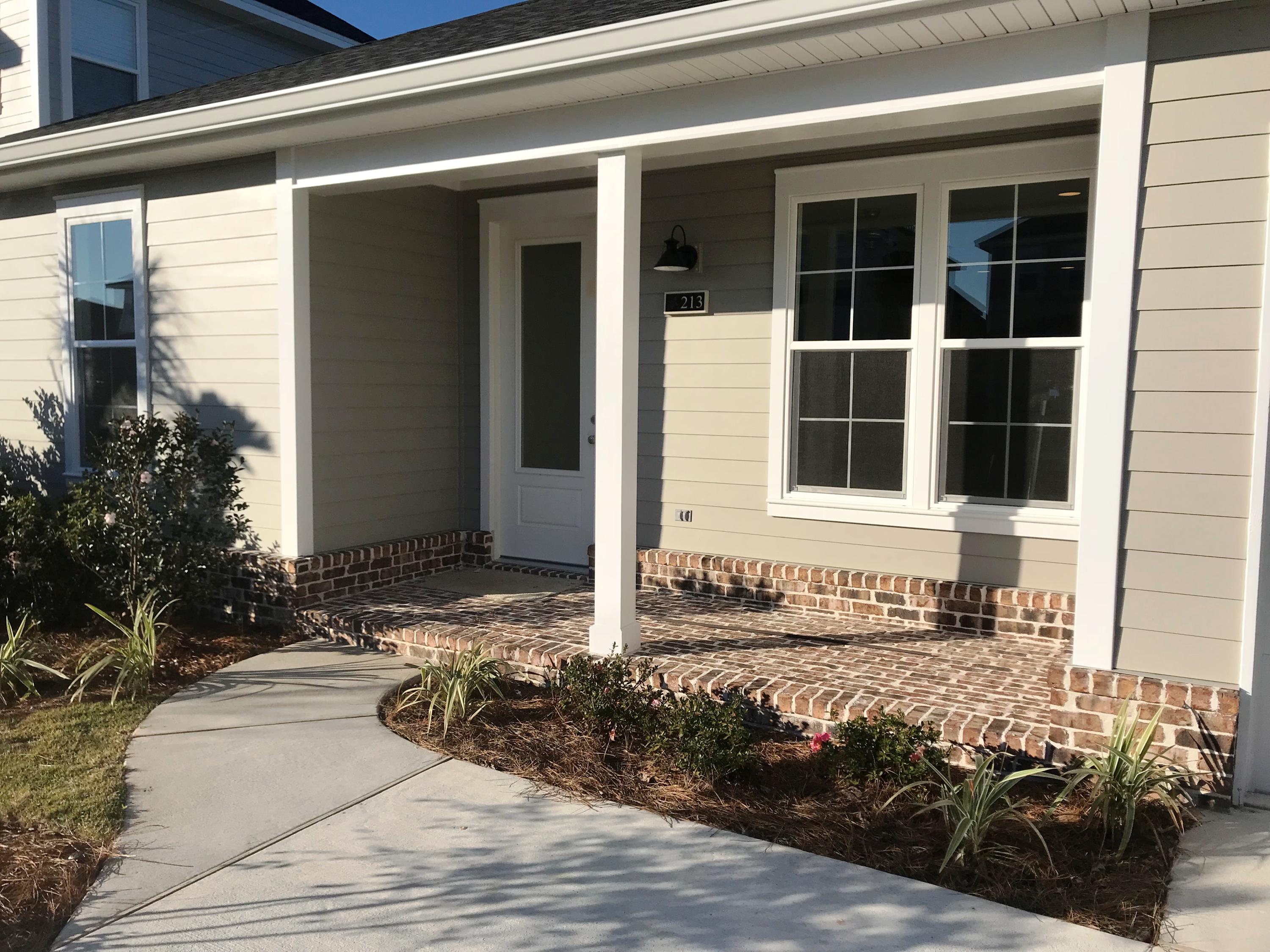 213 Chapman Street Santa Rosa Beach, FL 32459 - Photo 2 of 30 a view of a house with a small yard