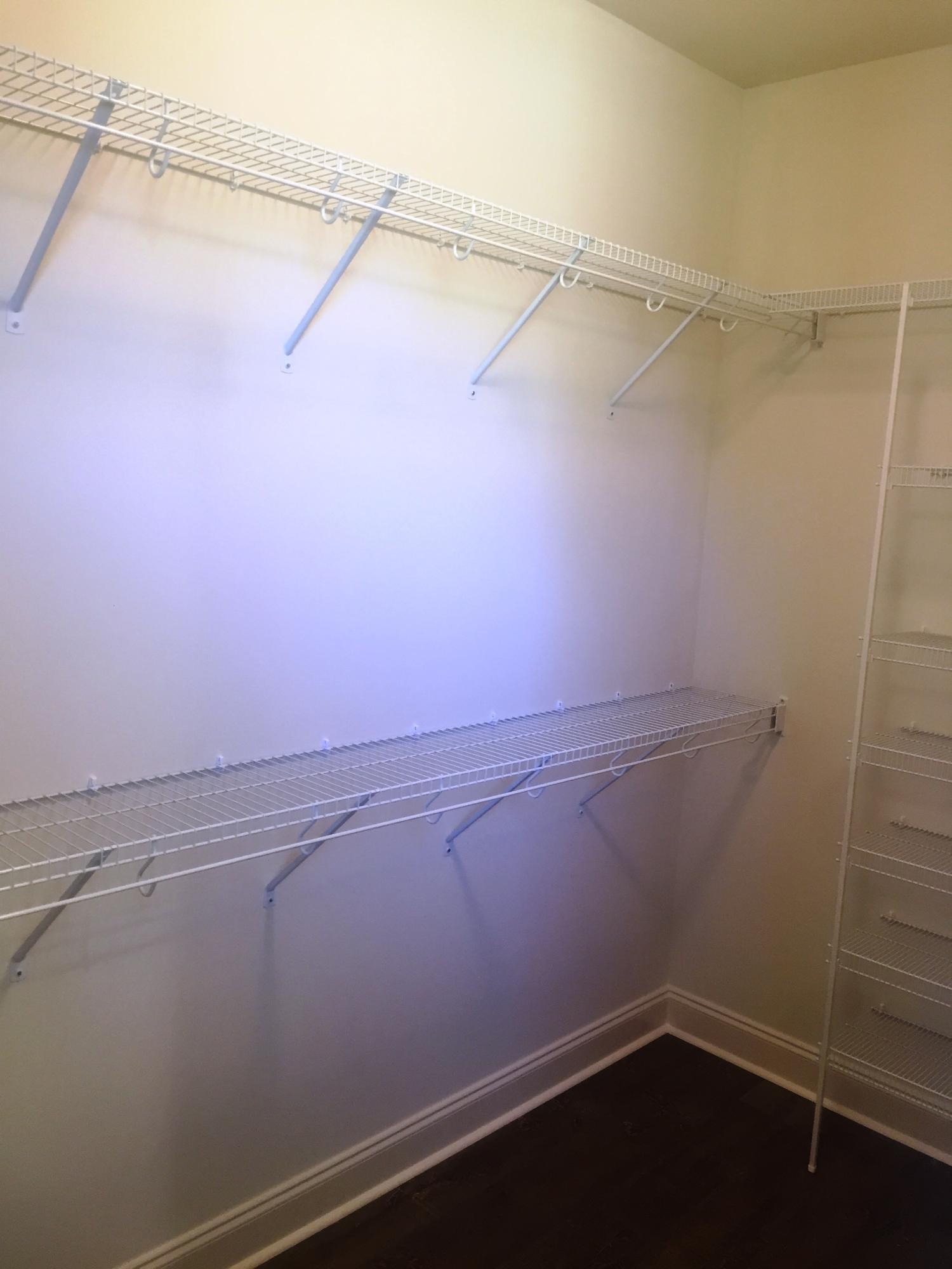 213 Chapman Street Santa Rosa Beach, FL 32459 - Photo 12 of 30 a view of a room with racks on the wall
