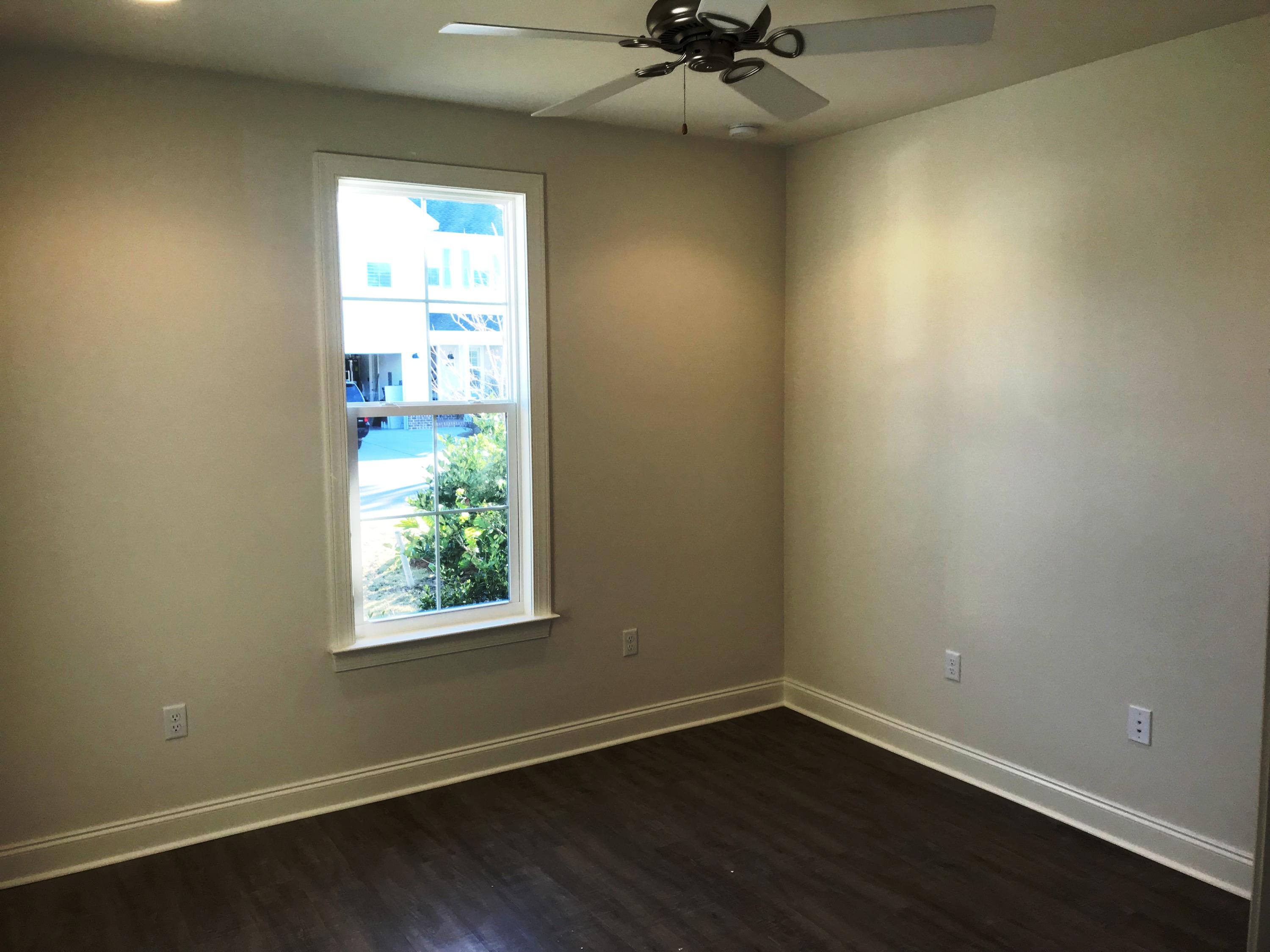 213 Chapman Street Santa Rosa Beach, FL 32459 - Photo 15 of 30 an empty room with a window