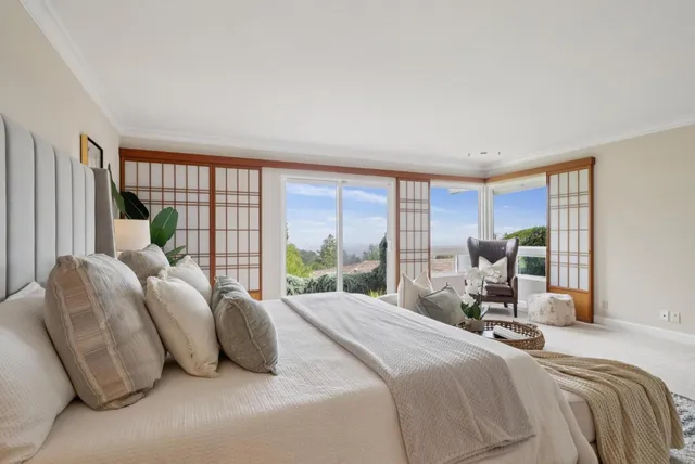 a spacious bathroom with a bathtub and sink