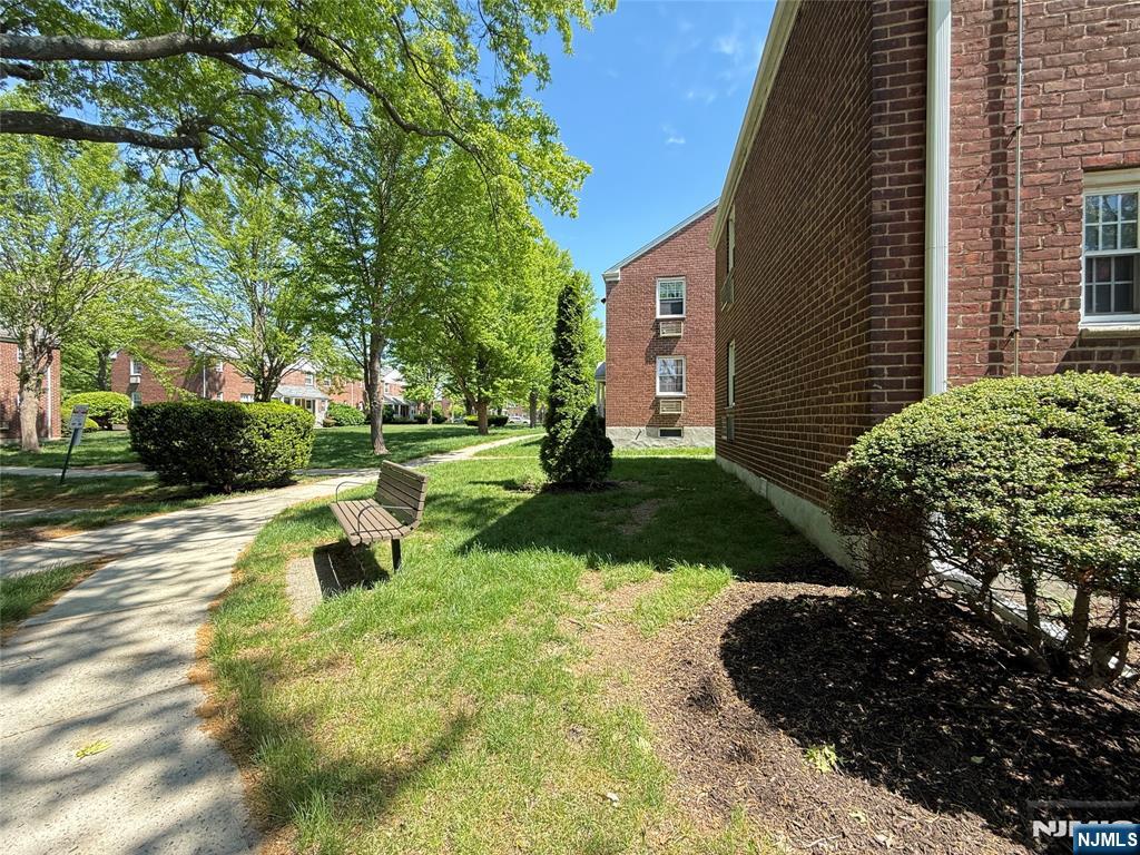 20 Clark Court Rutherford, NJ 07070 - Photo 25 of 29 a view of backyard with seating area and green space