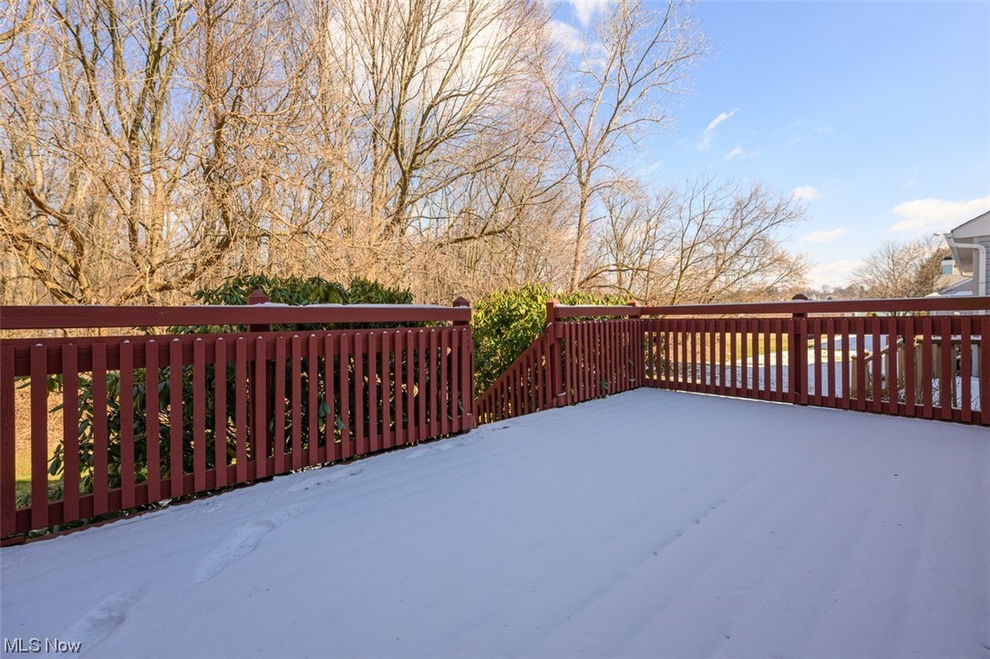 2231 Abbey Road Akron, OH 44312 - Photo 23 of 24 View of deck and back wooded area