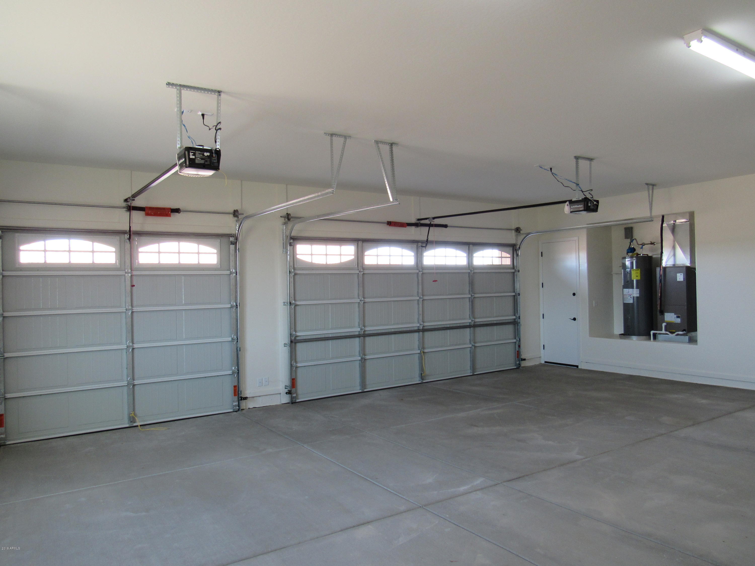 20141 West Steed Ridge Road Wittmann, AZ 85361 - Photo 20 of 23 3 Car Garage
