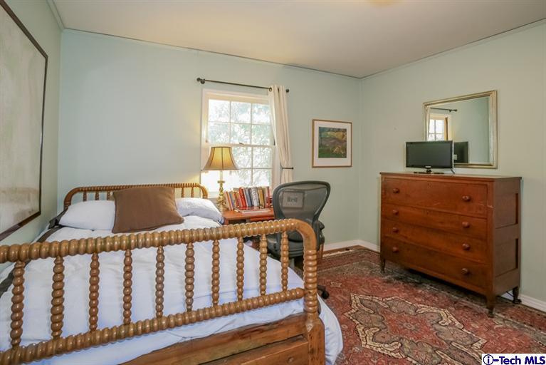 2221 Brigden Road Pasadena, CA 91104 - Photo 13 of 16 a view of a workspace with furniture and a window