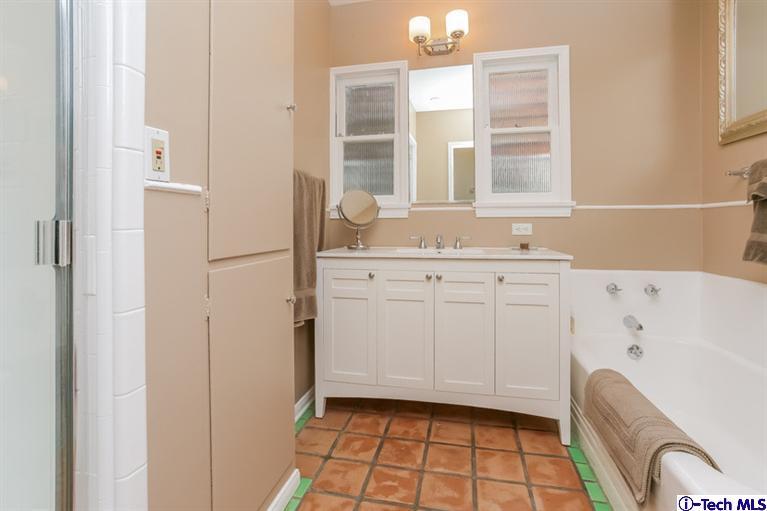 2221 Brigden Road Pasadena, CA 91104 - Photo 14 of 16 a room with window and cabinets