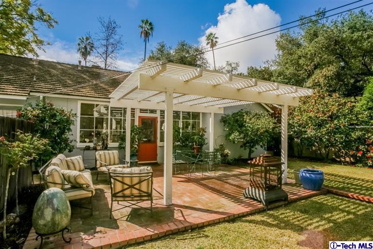2221 Brigden Road Pasadena, CA 91104 - Photo 15 of 16 a patio with table and chairs and potted plants