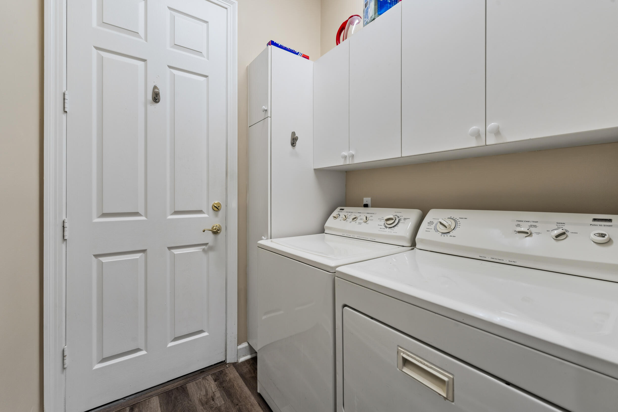 768 Southwest Whisper Ridge Trail Palm City, FL 34990 - Photo 25 of 40 a utility room with dryer and washer