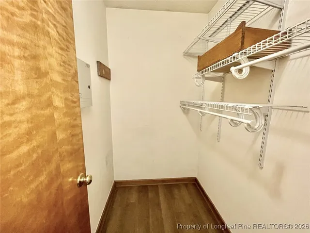 a view of a room with racks on the wall