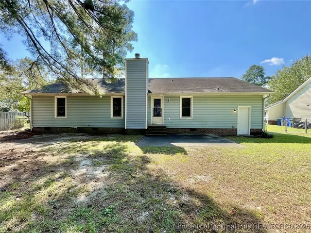 a house view with a swimming pool