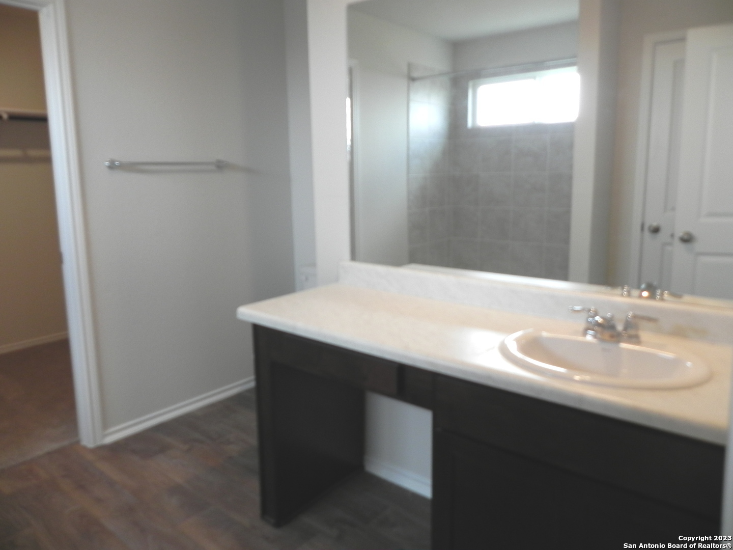 9506 Ranch Loop San Antonio, TX 78254 - Photo 13 of 25 a bathroom with a sink and a mirror