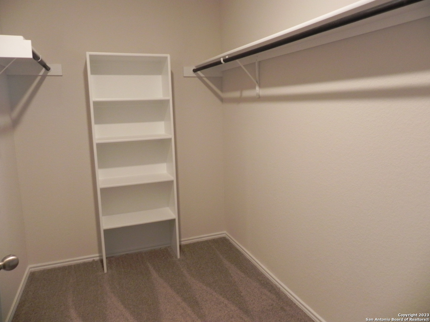 9506 Ranch Loop San Antonio, TX 78254 - Photo 15 of 25 a view of an empty walk in closet