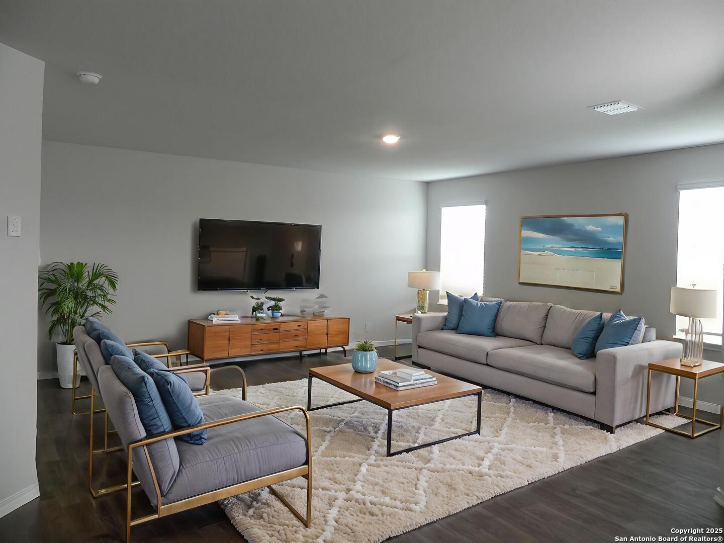 9506 Ranch Loop San Antonio, TX 78254 - Photo 8 of 25 a living room with furniture and a flat screen tv