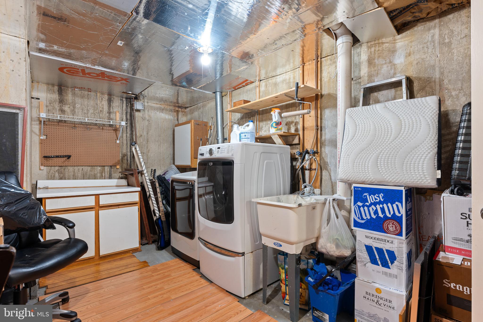 19 Windsor Circle Chesterbrook, PA 19087 - Photo 26 of 28 Unfinished portion of basement with laundry area
