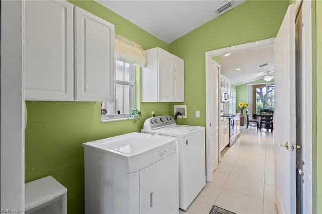 a view of hallway with washer and dryer