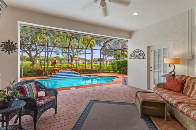 a living room with couch and a table
