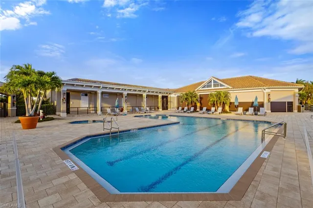 a view of a house with swimming pool