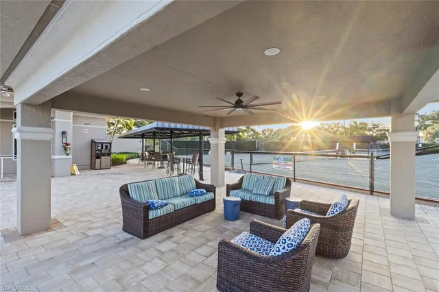 a living room with furniture and a table