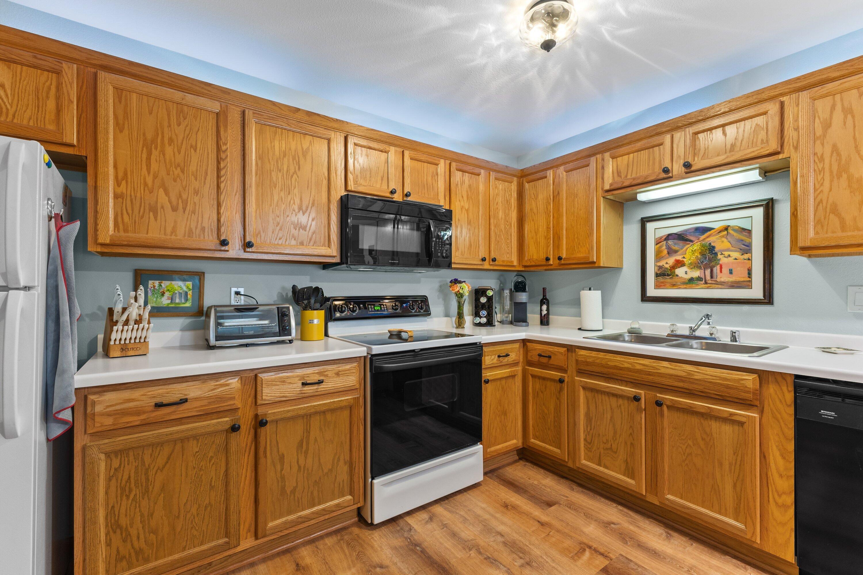 9342 West Loomis Road, Unit 8 Franklin, WI 53132 - Photo 9 of 29 spacious open kitchen