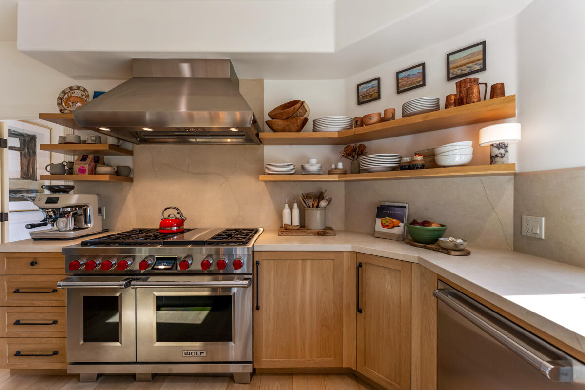 13100 Ojai Road Santa Paula, CA 93060 - Photo 16 of 60 a kitchen with a stove and cabinets