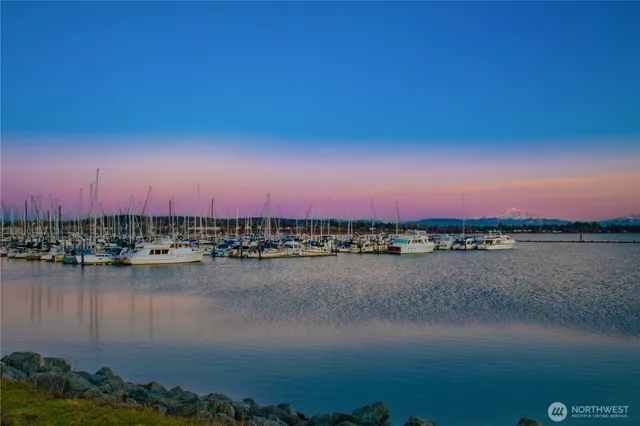 a view of a lake in a sunset