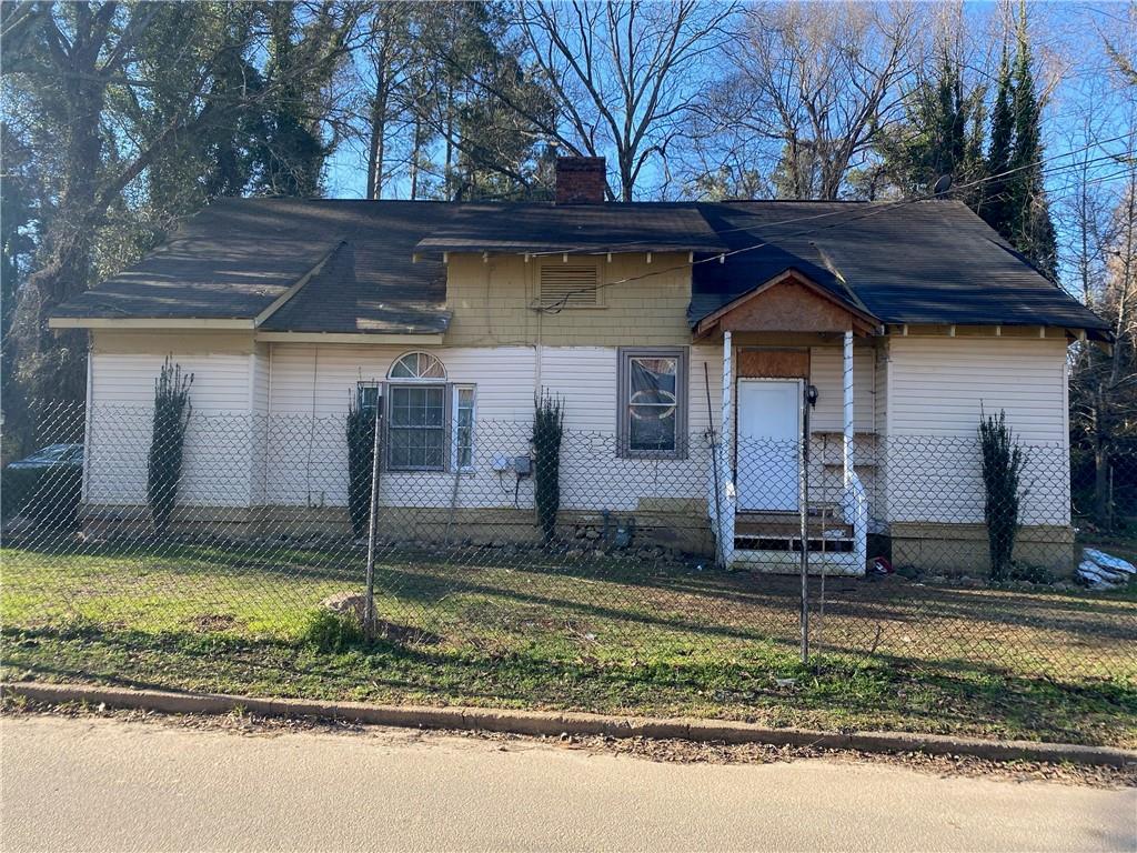 30 Stallworth Street Gainesville, GA 30501 - Photo 1 of 1 a front view of a house with garden