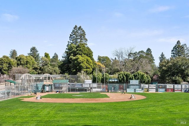 a view of a house with a big yard