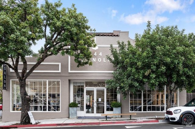 a building with trees in front of it