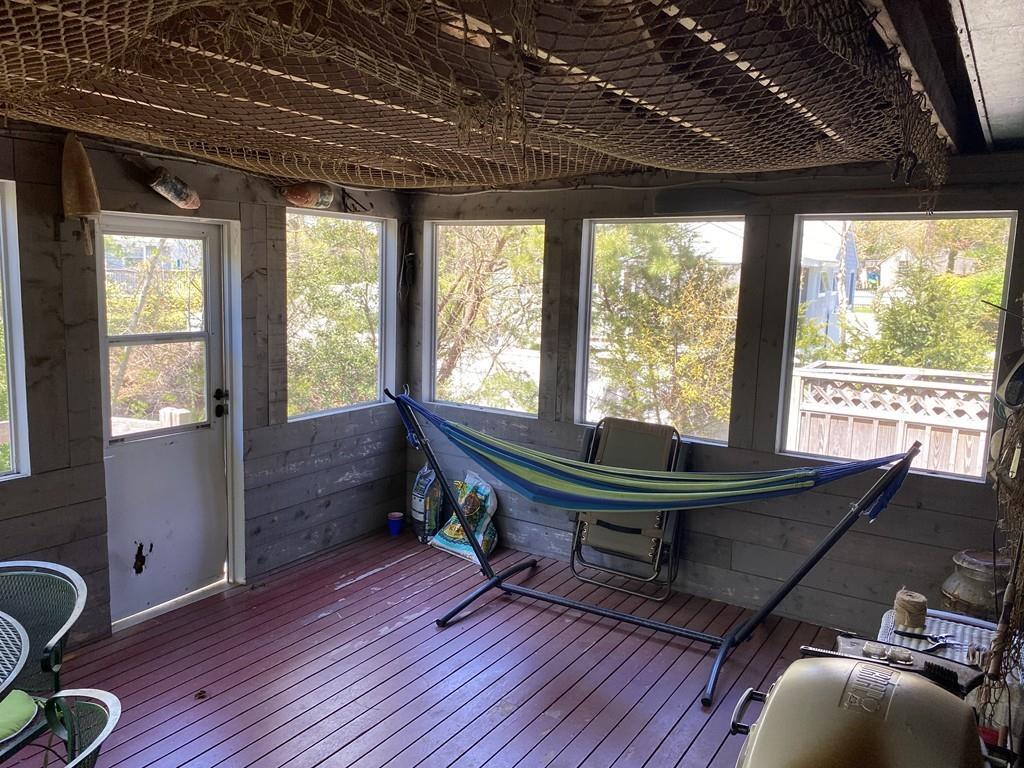 9 Uncle Percy's Road Mashpee, MA 02649 - Photo 12 of 16 a room with furniture pool table wooden floor and windows