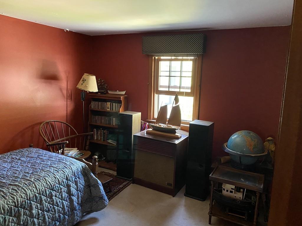 9 Uncle Percy's Road Mashpee, MA 02649 - Photo 7 of 16 a bedroom with a bed and a window