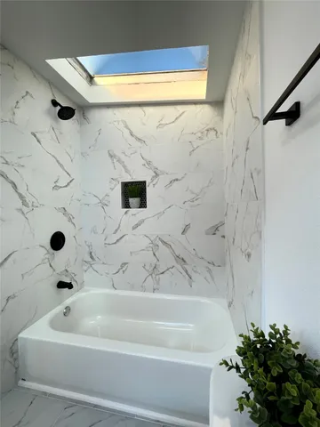 a bathroom with a bathtub
