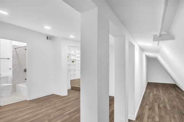 a view of entryway with wooden floor