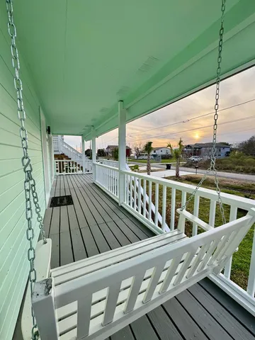 a porch with seating space