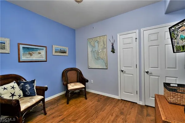 a room with furniture and wooden floor