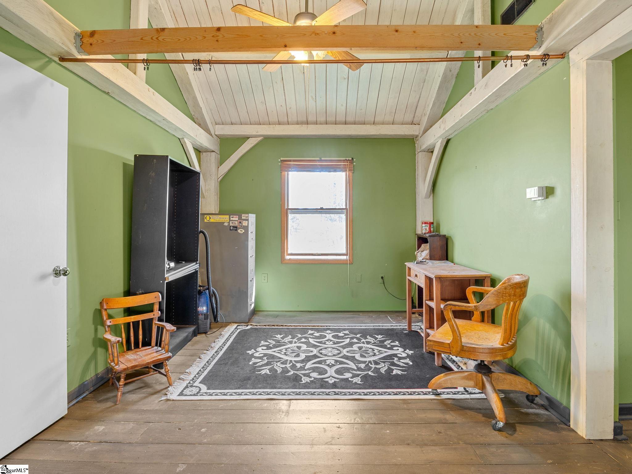 405 Loop Road Campobello, SC 29322 - Photo 19 of 49 This open space on the upper level would make a perfect office or reading room.