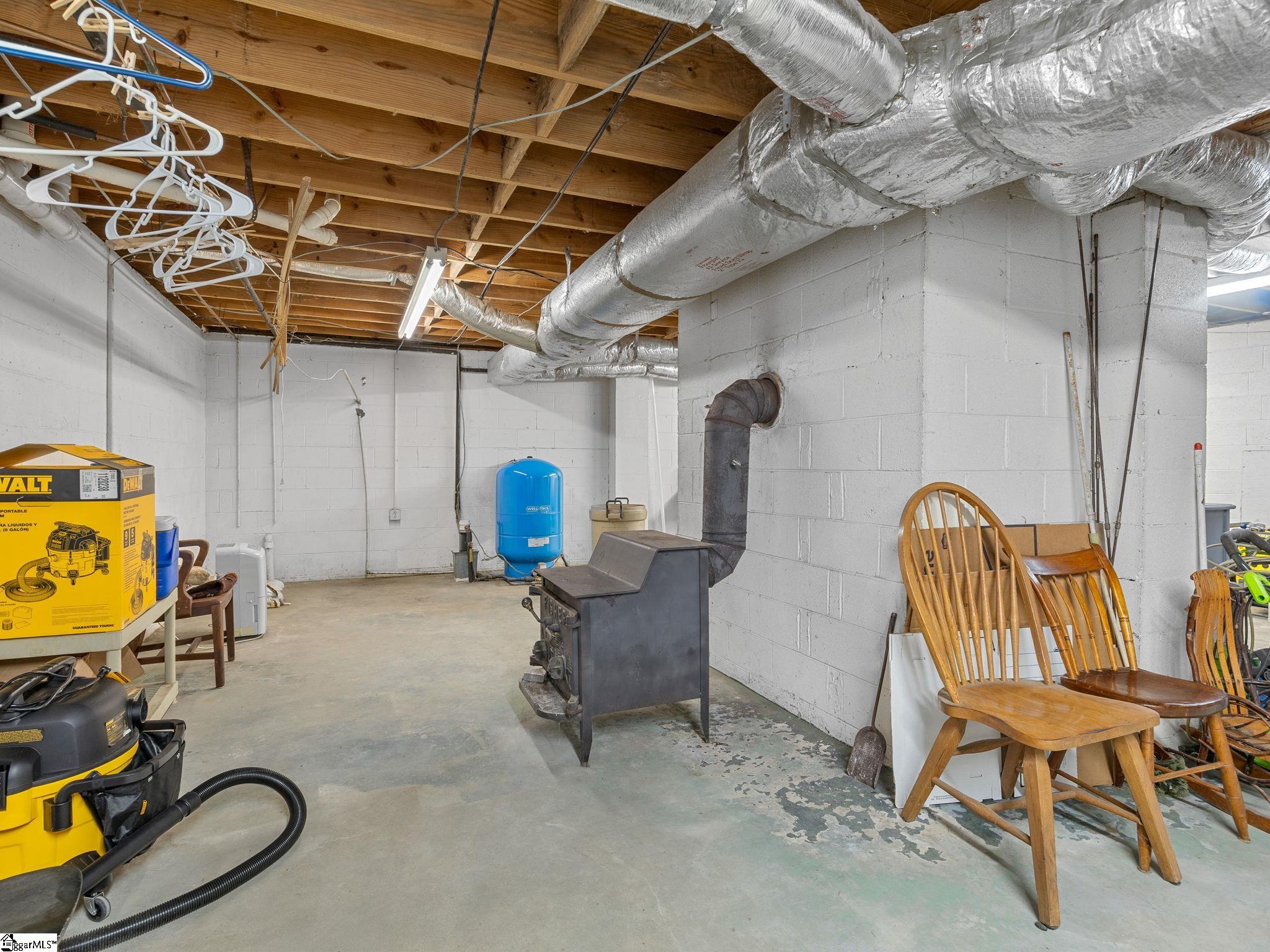 405 Loop Road Campobello, SC 29322 - Photo 28 of 49 There is a wood stove in the unfinished basement which has interior and exterior access.