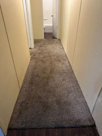 a view of a hallway to a house