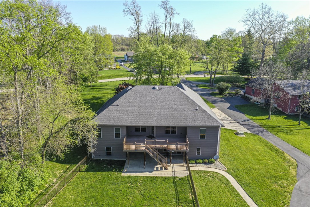3681 Wilmington Road Lebanon, OH 45036 - Photo 81 of 87 This elevated residence features a spacious deck overlooking a verdant landscape.
