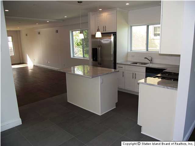 29 Midland Road Staten Island, NY 10308 - Photo 5 of 20 a kitchen with a sink cabinets and window