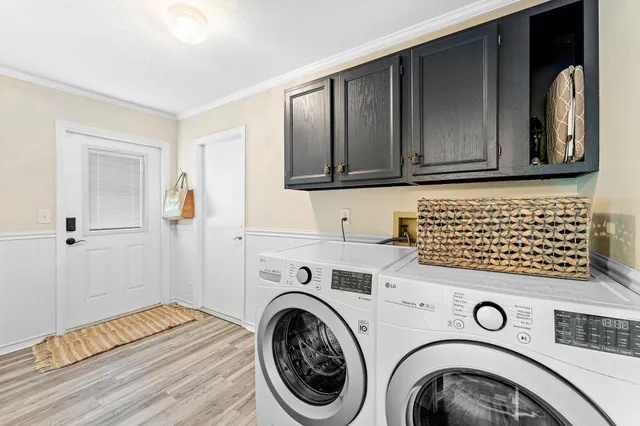 a view of washer and dryer with washer and dryer