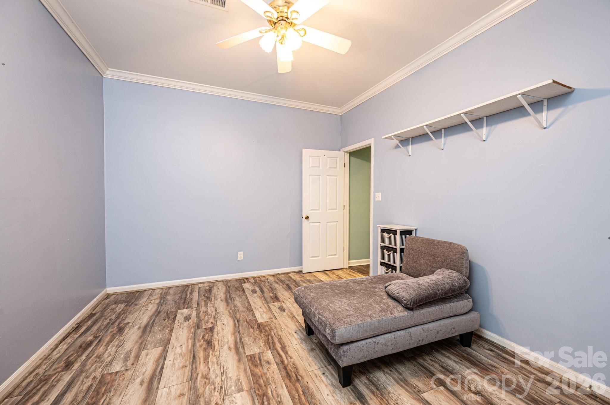826 6th Street Northwest, Unit 4 Hickory, NC 28601 - Photo 14 of 25 a living room with furniture and a window