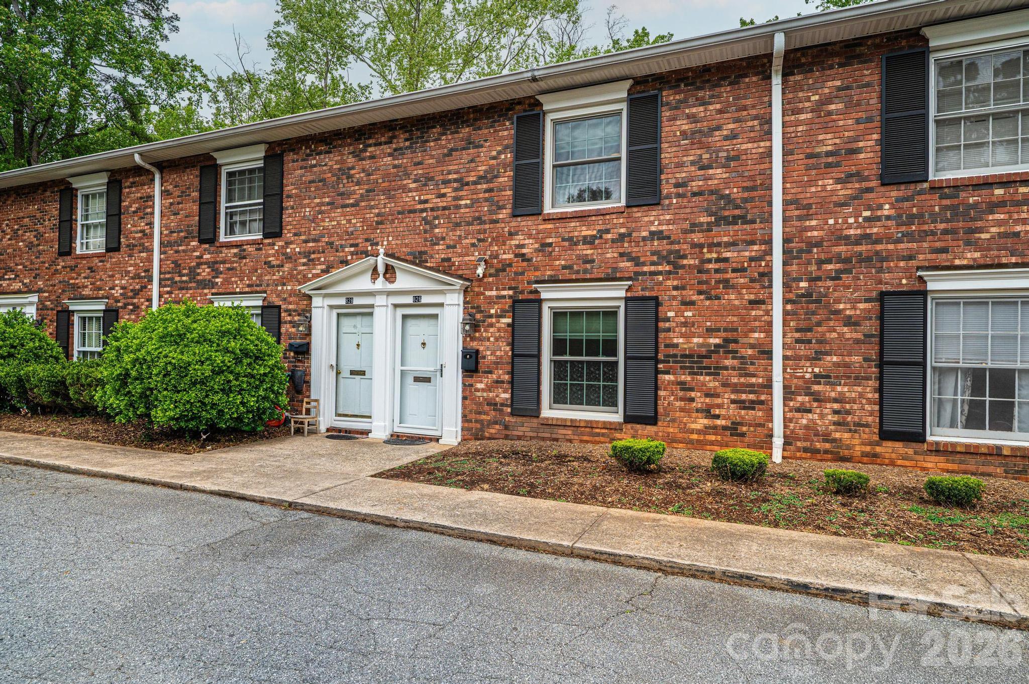 826 6th Street Northwest, Unit 4 Hickory, NC 28601 - Photo 2 of 25 front view of a house with a yard