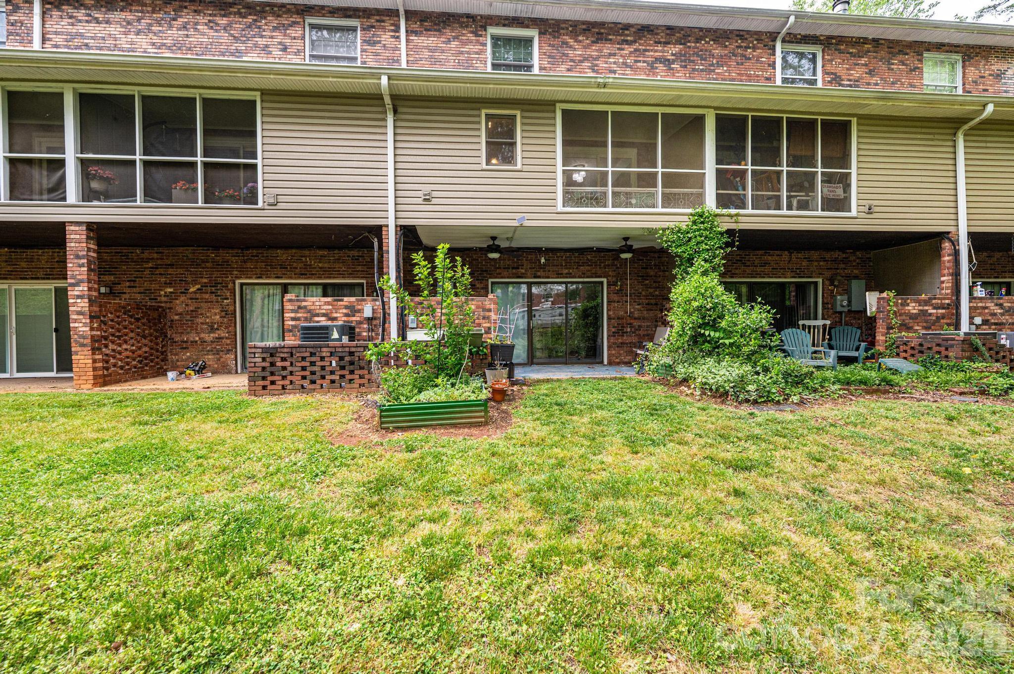 826 6th Street Northwest, Unit 4 Hickory, NC 28601 - Photo 25 of 25 a house view with a garden space