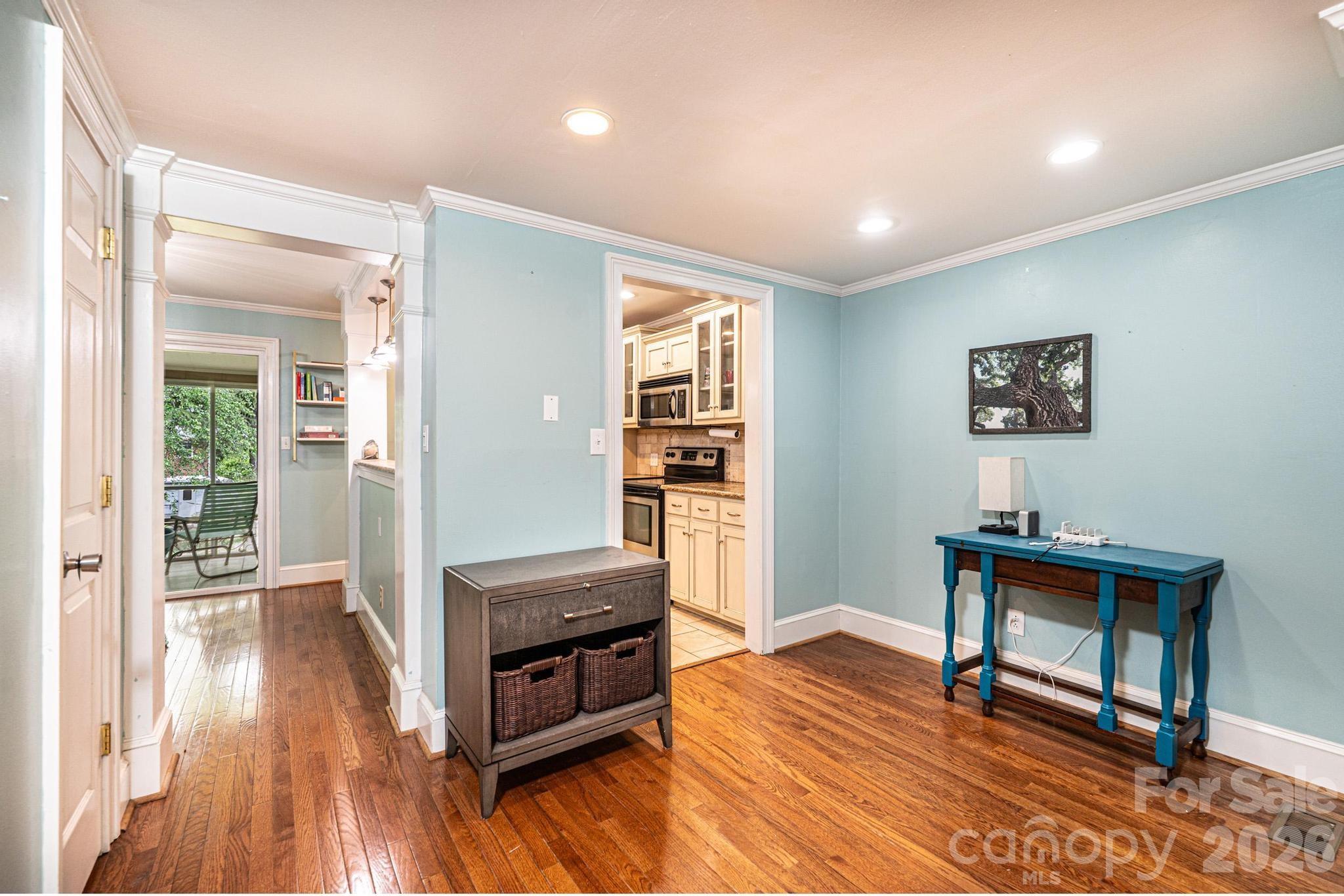 826 6th Street Northwest, Unit 4 Hickory, NC 28601 - Photo 5 of 25 a living room with furniture and a wooden floor