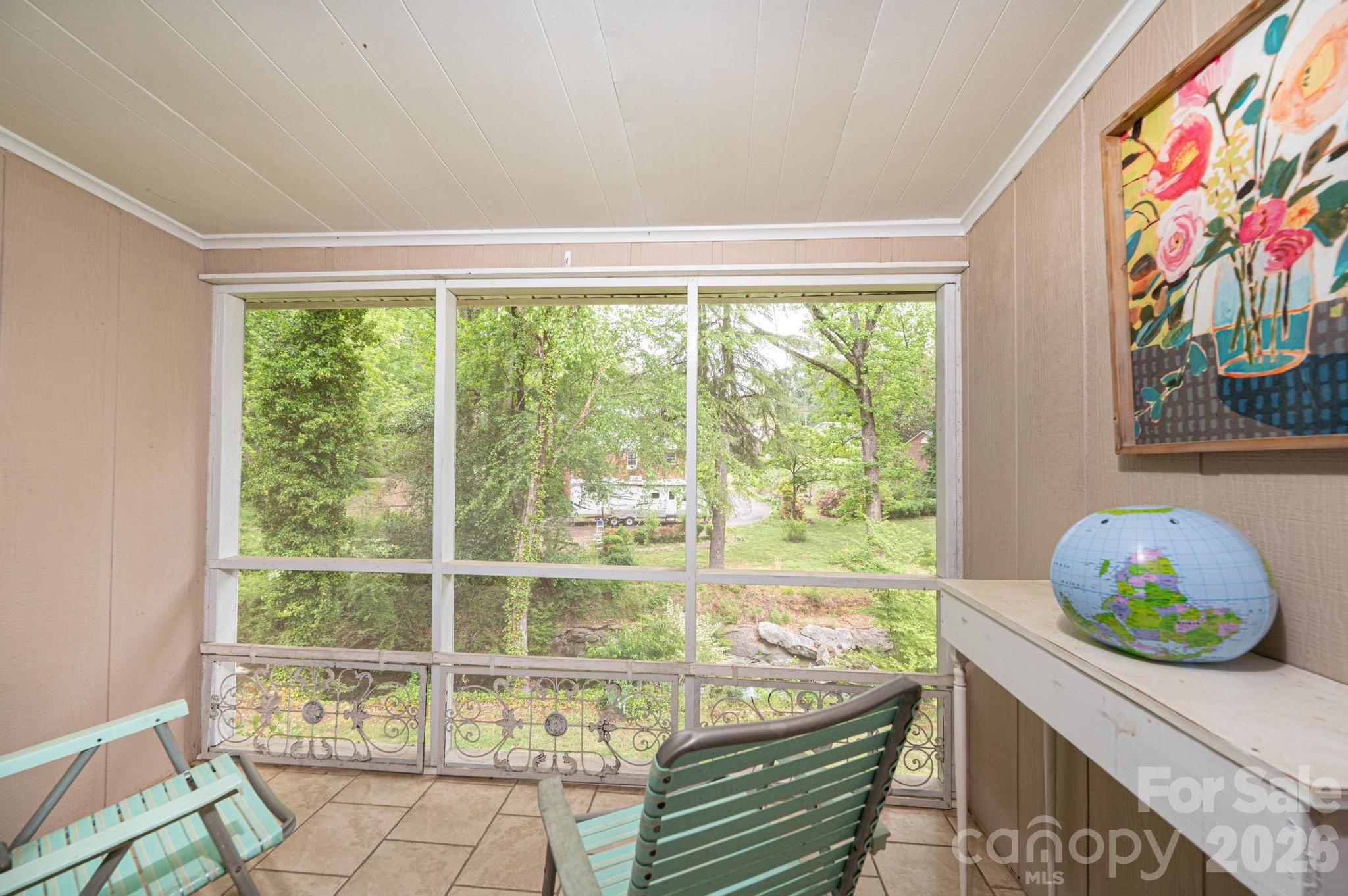 826 6th Street Northwest, Unit 4 Hickory, NC 28601 - Photo 10 of 25 a room with a large window and bed