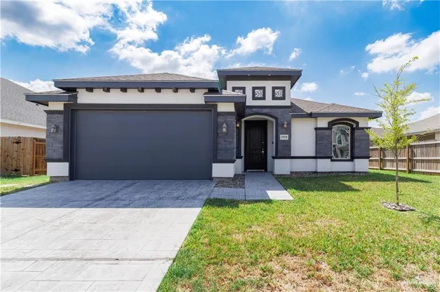 a front view of house with yard