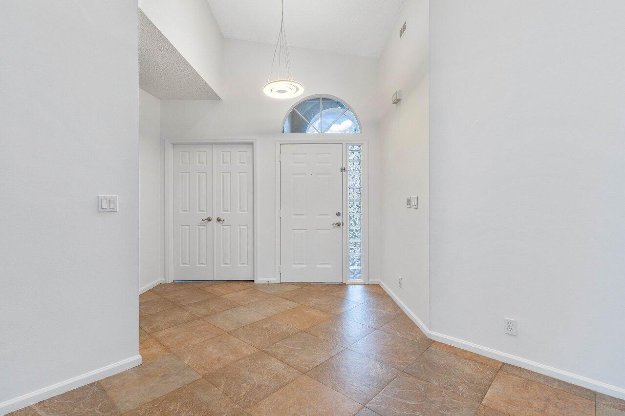 22840 Windsor Wood Court Boca Raton, FL 33433 - Photo 27 of 42 Foyer Chandeliered entrance