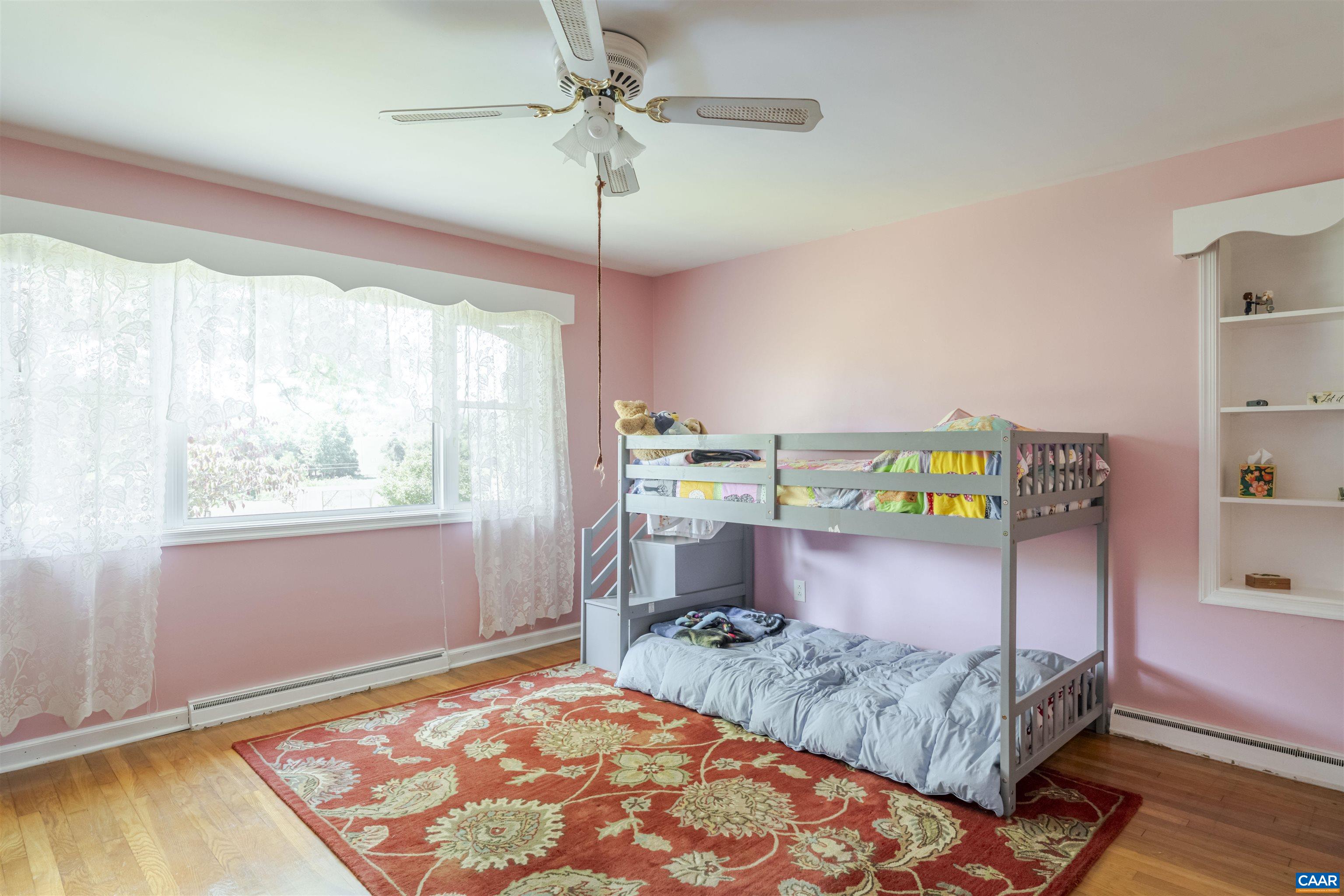 691 Old Roseland Road Roseland, VA 22967 - Photo 17 of 47 a bedroom with a bed and a dresser